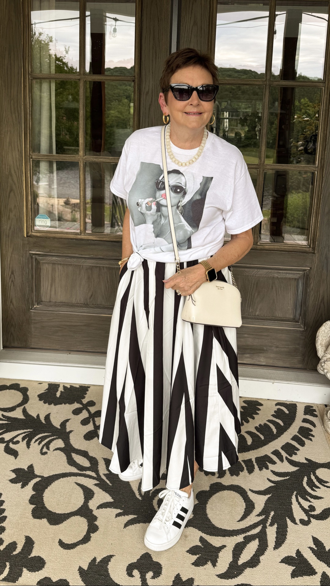 Looking fashionable at any age! Same skirt and graphic tee styled for casual shopping.

#LTKOver40 #LTKMidsize #LTKSeasonal