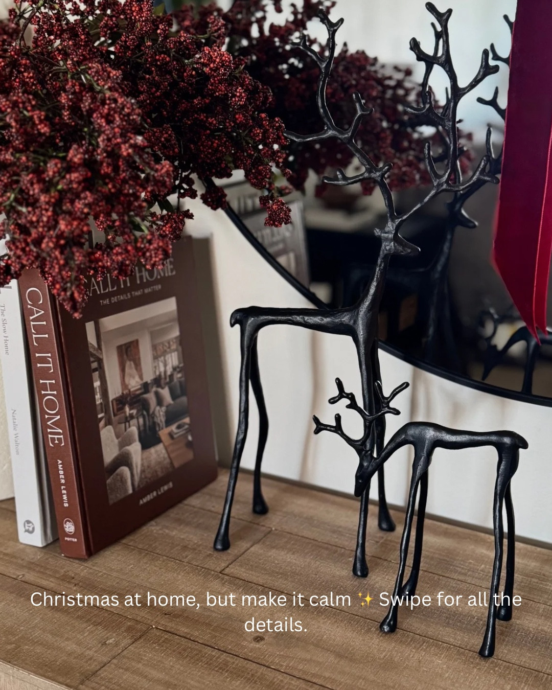 Christmas console table, entryway table, black reindeer, coffee table books, nandina berry stems, burgundy stems, burgundy velvet ribbon, white vase, arwah console, wayfair console table, round mirror 

#LTKSeasonal #LTKHome #LTKHoliday