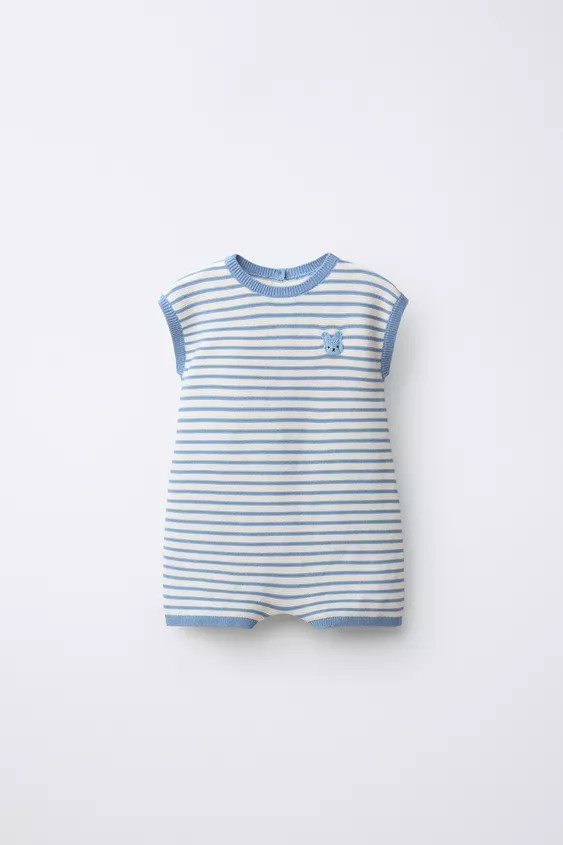 Short knit playsuit with a round neck and short sleeves. Button fastening at the back. Featuring ... | Zara UK