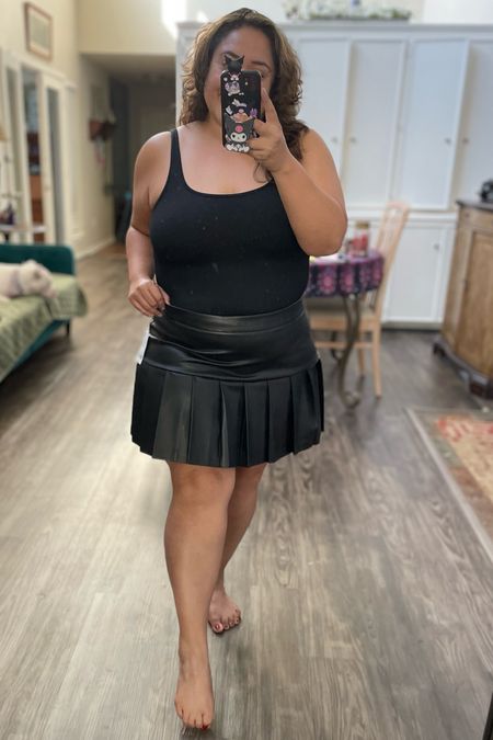 Fall capsule wardrobe: Vegan black skirt with ribbed body suit. I will have to style these but the skirt is a part of the Macy’s fab fall sale. The body suit has a light compression and comes in a 3 pack with 2 other colors on amazon.

#LTKHoliday #LTKover40 #LTKmidsize
