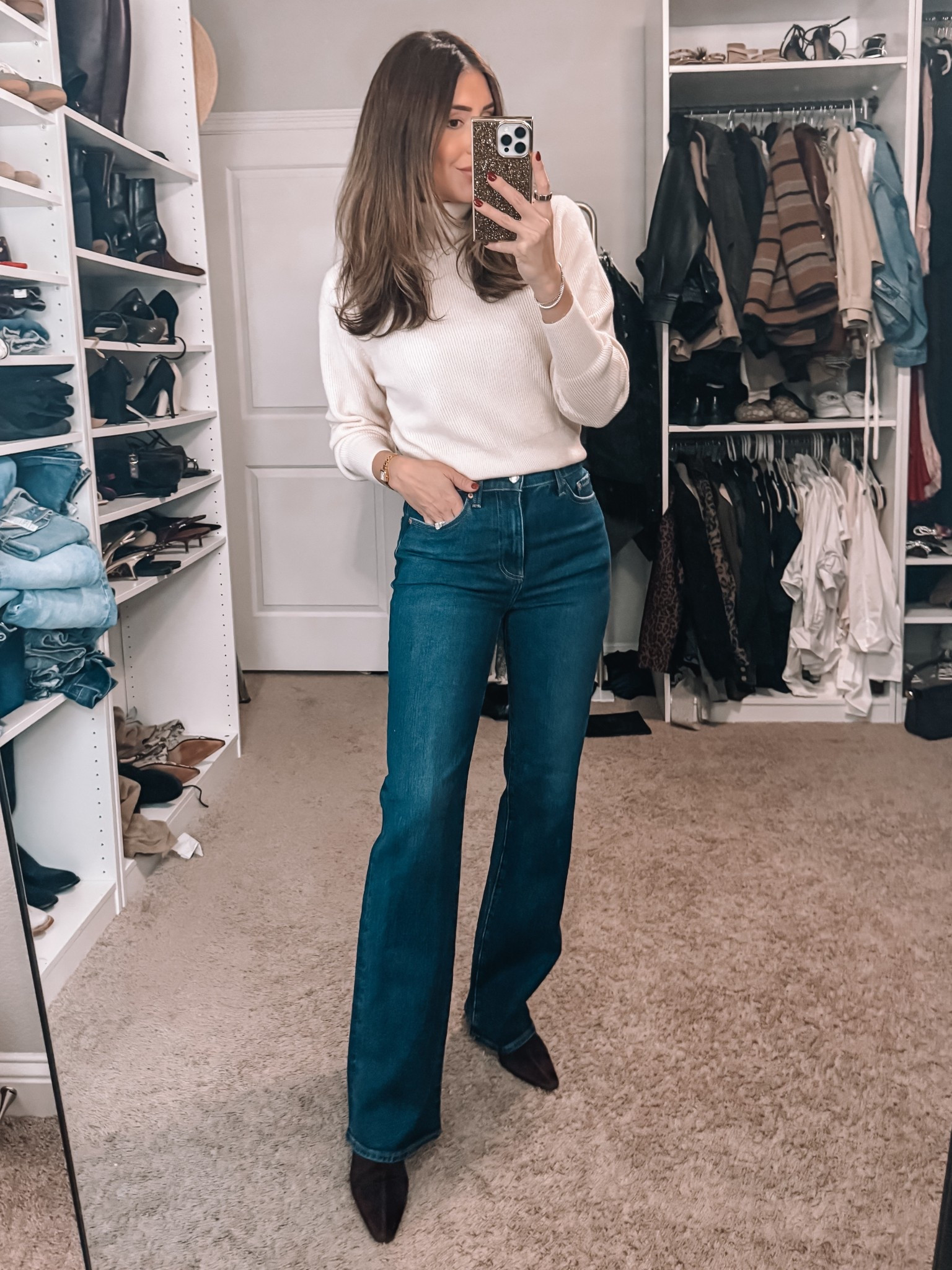 Small in sweater, size 26 in jeans 