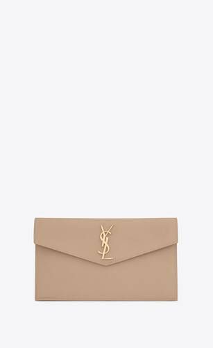 Small envelope clutch with a flap featuring THE CASSANDRE. | Saint Laurent Inc. (Global)
