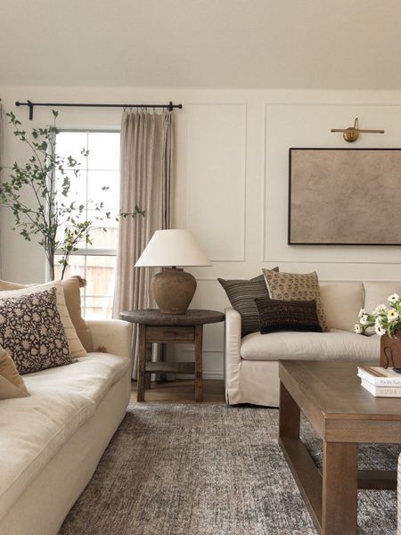 Living room inspo!

Amber interiors, McGee & co, earthy living room, floral pillow, wood side table, Etsy side table, Etsy finds, Etsy pillows, slipcovered couch, affordable coffee table, pinch pleat curtains, Amazon free, coffee table, art, frame light, living room finds, living room decor 

#LTKStyleTip #LTKHome
