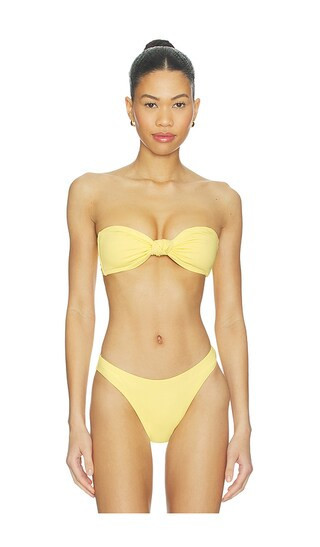 Good American Matte Twist Bandeau Bikini Top in Yellow. - size XS | Revolve Clothing (Global)