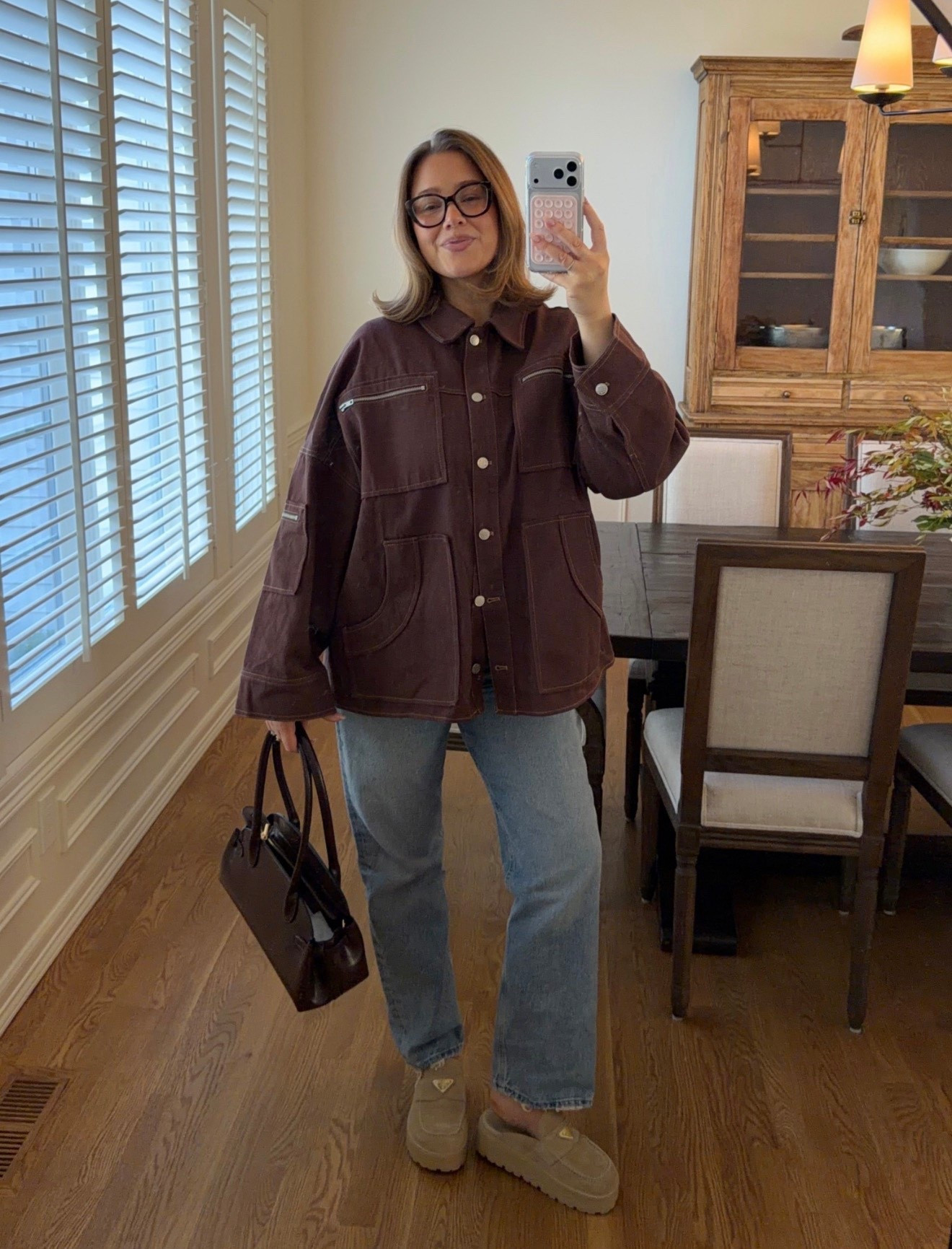 Jacket size medium it’s cotton so air dry but it has a nice looser fit to it and I love this chocolate brown! Jeans tts 29 they have a thinner taper then a lot of my jeans for a little more polished look. Bag is Amazon and stunning!!!

#revolve #agolde #pradaloafer #amazonpurse #bresheppard