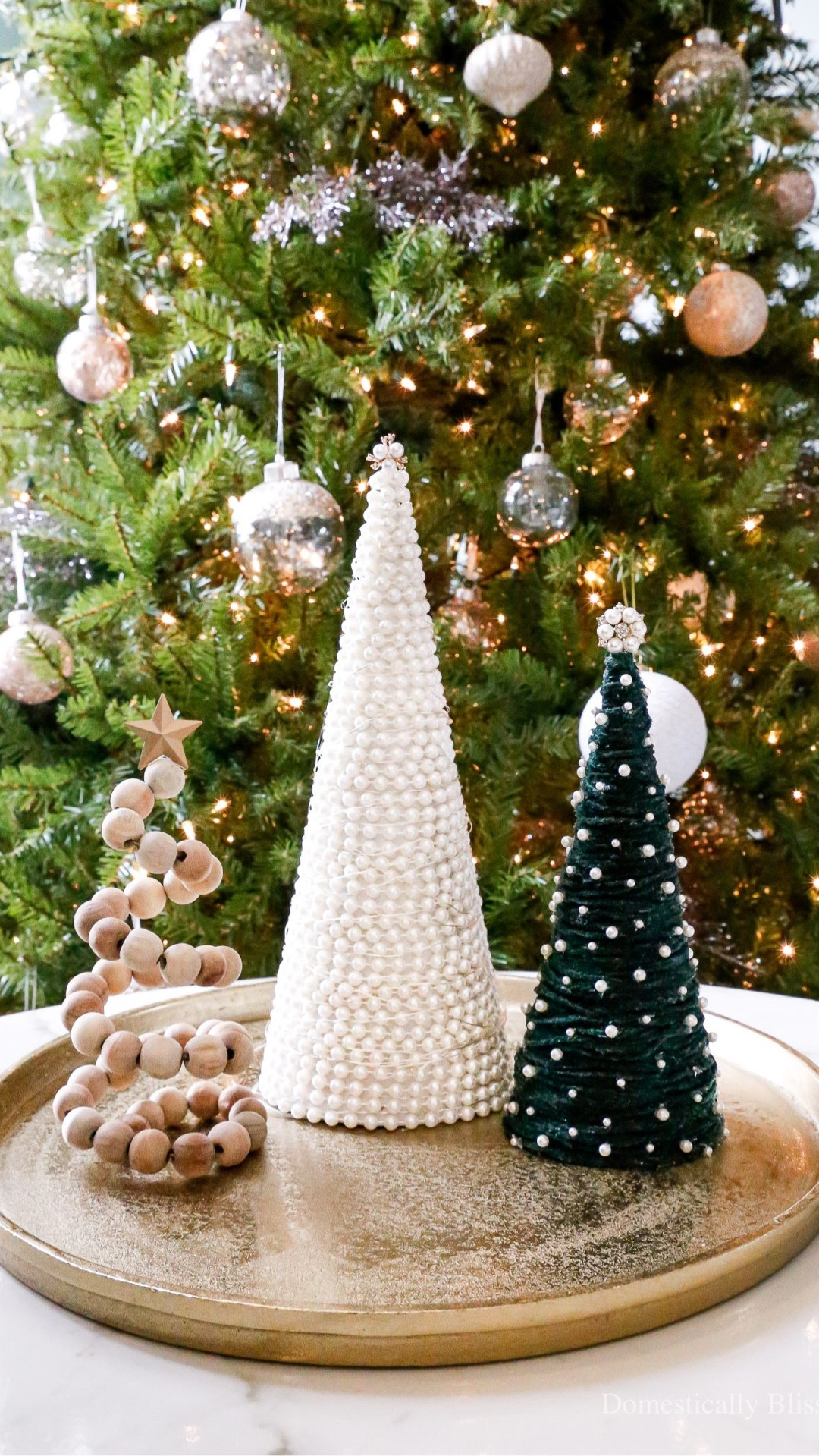 This DIY Pearl Christmas Tree is an easy and fun Christmas craft, especially with the addition of twinkle lights.

See details:
https://domesticallyblissful.com/diy-pearl-christmas-tree/

🔗 Join our newsletter: https://domesticallyblissful.com/newsletter/ 

#LTKHome #LTKHoliday #LTKSeasonal