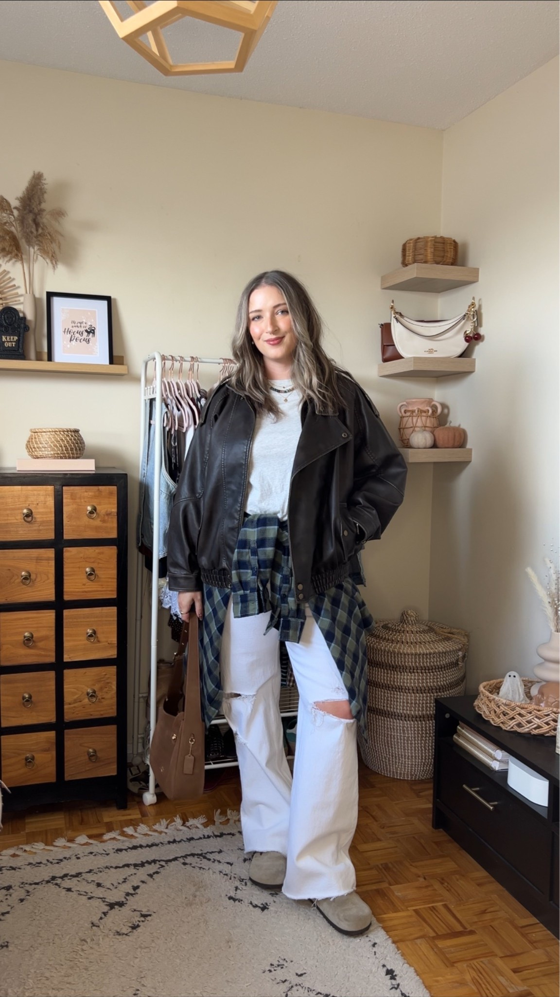 Casual fall outfit! Size M in the plaid flannel shirt, size L in the leather jacket and grey tee (Canadian tee link under “similar products), and size 30 in the white jeans. I’m a 9.5-10 shoe and wear a 40 in the Birkenstocks
