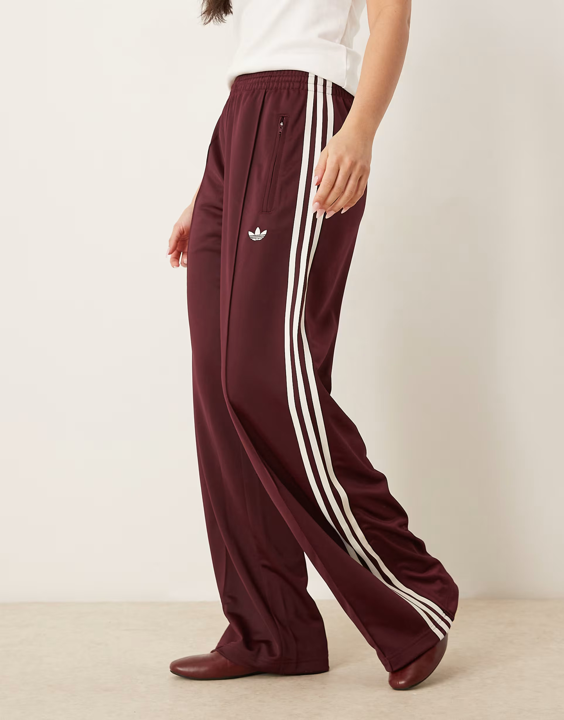 adidas Originals Firebird Loose track pants in burgundy | ASOS | ASOS (Global)