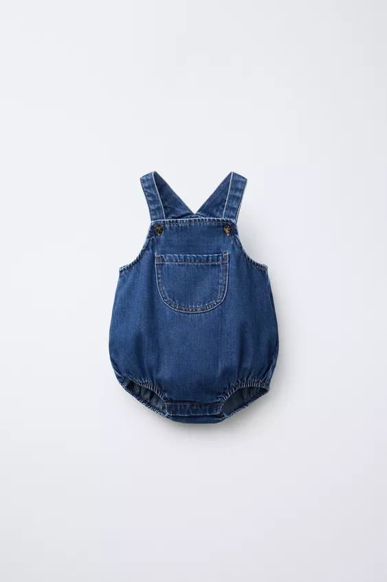 Denim romper with a straight neckline and straps with a front button fastening. Featuring a front... | Zara UK