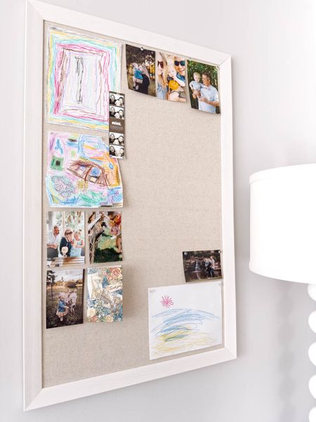 I just added a large fabric pin board to my office to showcase Eliza’s favorite art and new family photos. If you don’t want pin holes in your photos, here’s a solution for that! home decor office decor kid art solution bulletin board wall art

#LTKstyletip #LTKfamily #LTKhome