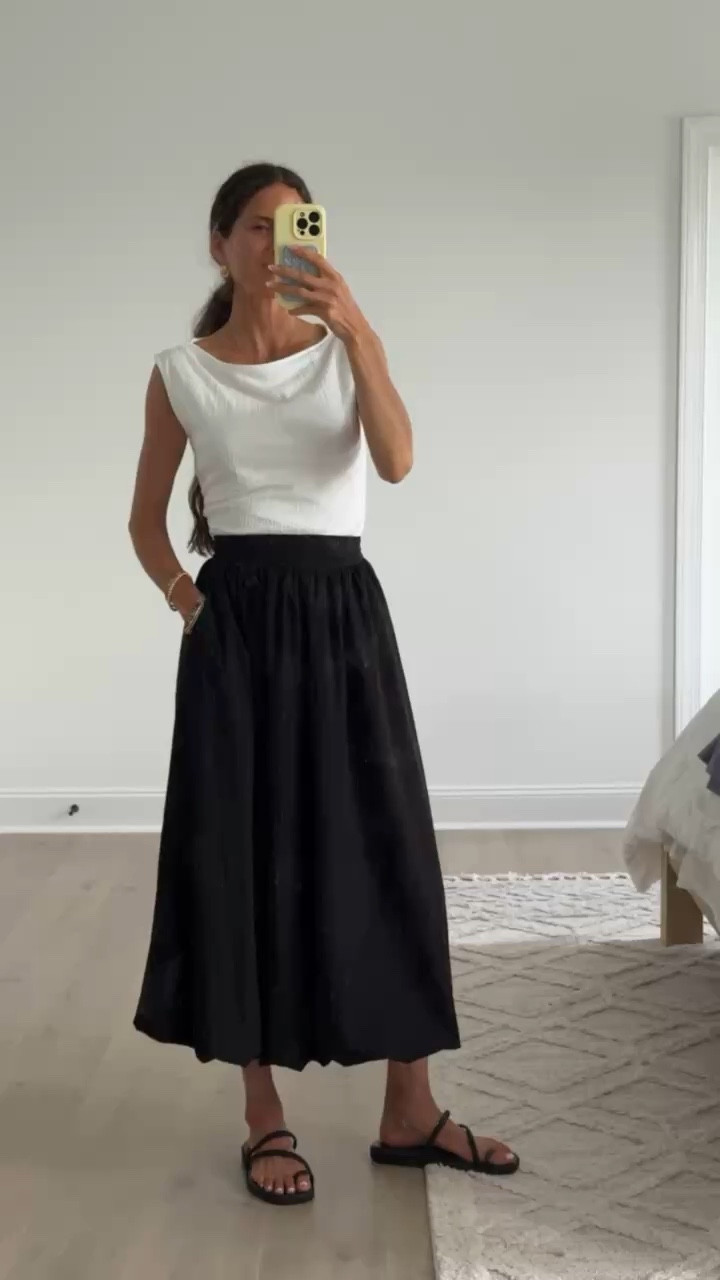 If you’re building a capsule wardrobe, start with a black midi skirt. It works for brunch, travel days, date nights, work meetings, and everything in between. Sharing how I styled this versatile favorite today.

#LTKSeasonal #LTKmomlife #LTKgrwm
