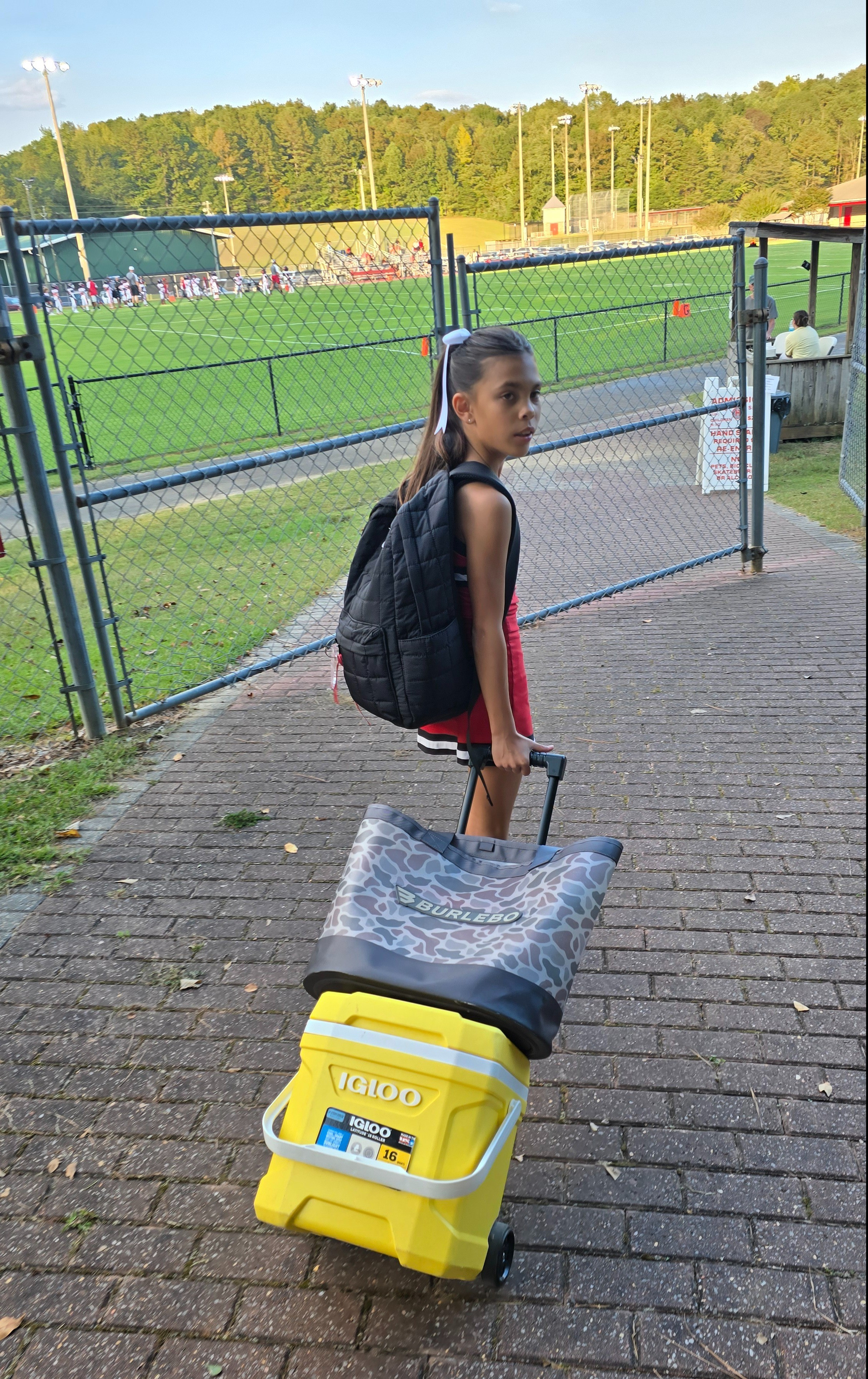 This has become our favorite bag.  Large, light weight, handles are extra long so you can carry it easily over your shoulders 

