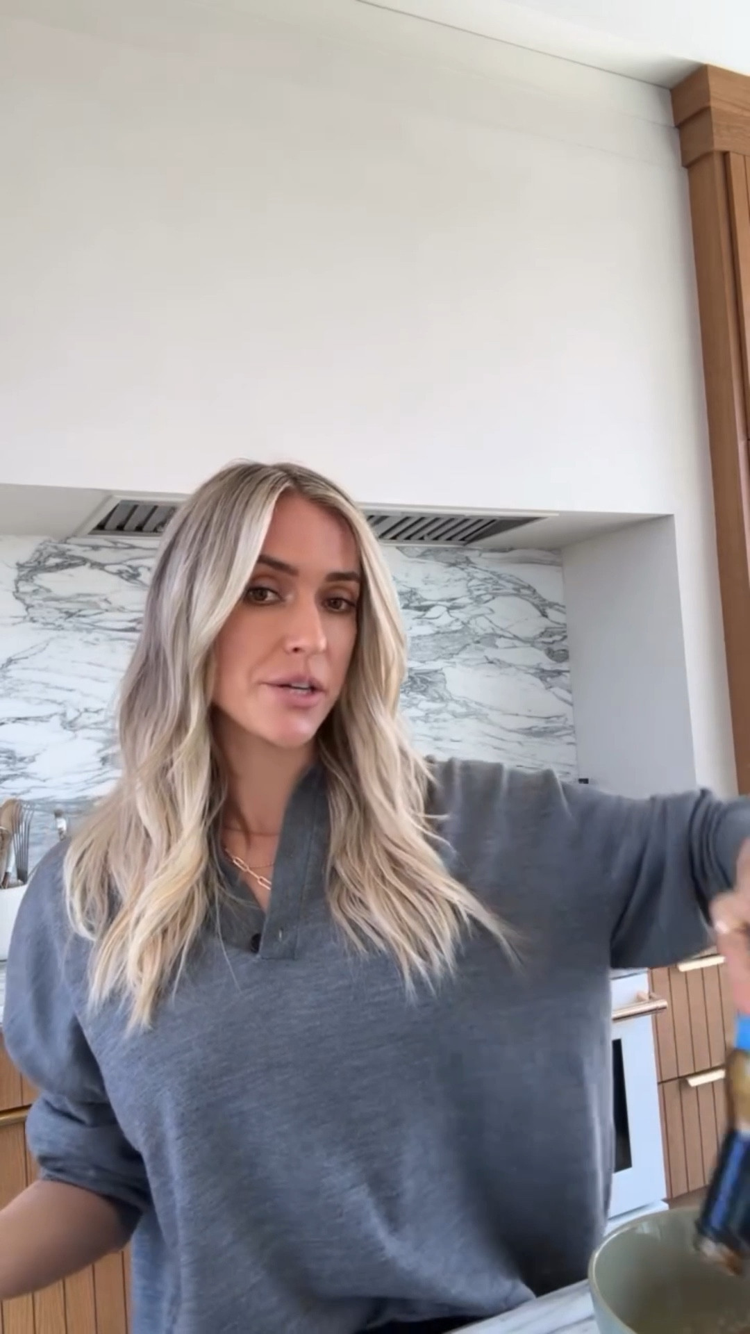 Kristin Cavallari medium heather gray  elevated polo sweater made from midweight our signature wool-cashmere blend 