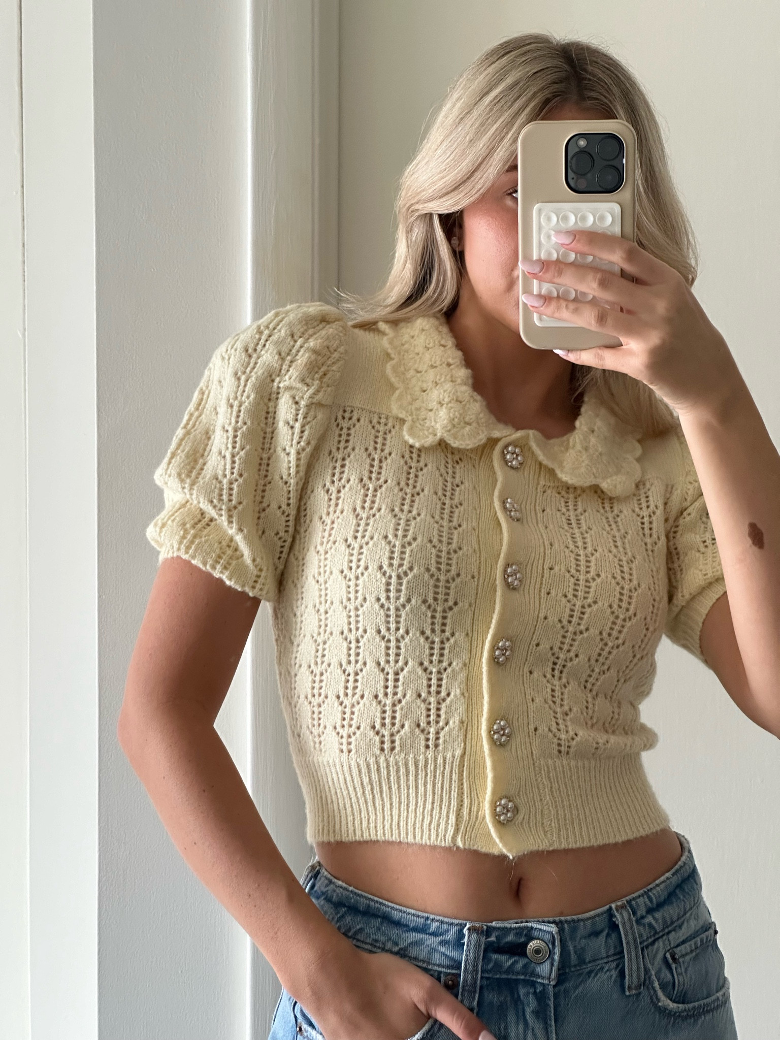 This pale yellow sweater with pearl button details is so perfect for any spring wardrobe! 

#LTKfindsunder100 #LTKstyletip #LTKSeasonal