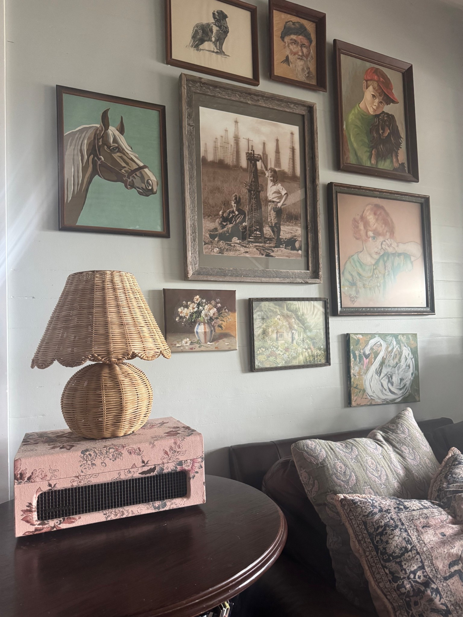 Loving Lately: I recently thrifted this vintage horse paint by number for $5. I then restyled my side table to include my beautiful record player and wicker lamp, and I love this whole cozy scene in my living room. The gallery wall is still a work in progress, but I love that the majority of the pieces were thrifted and collected over time. What do you think?

#LTKHome