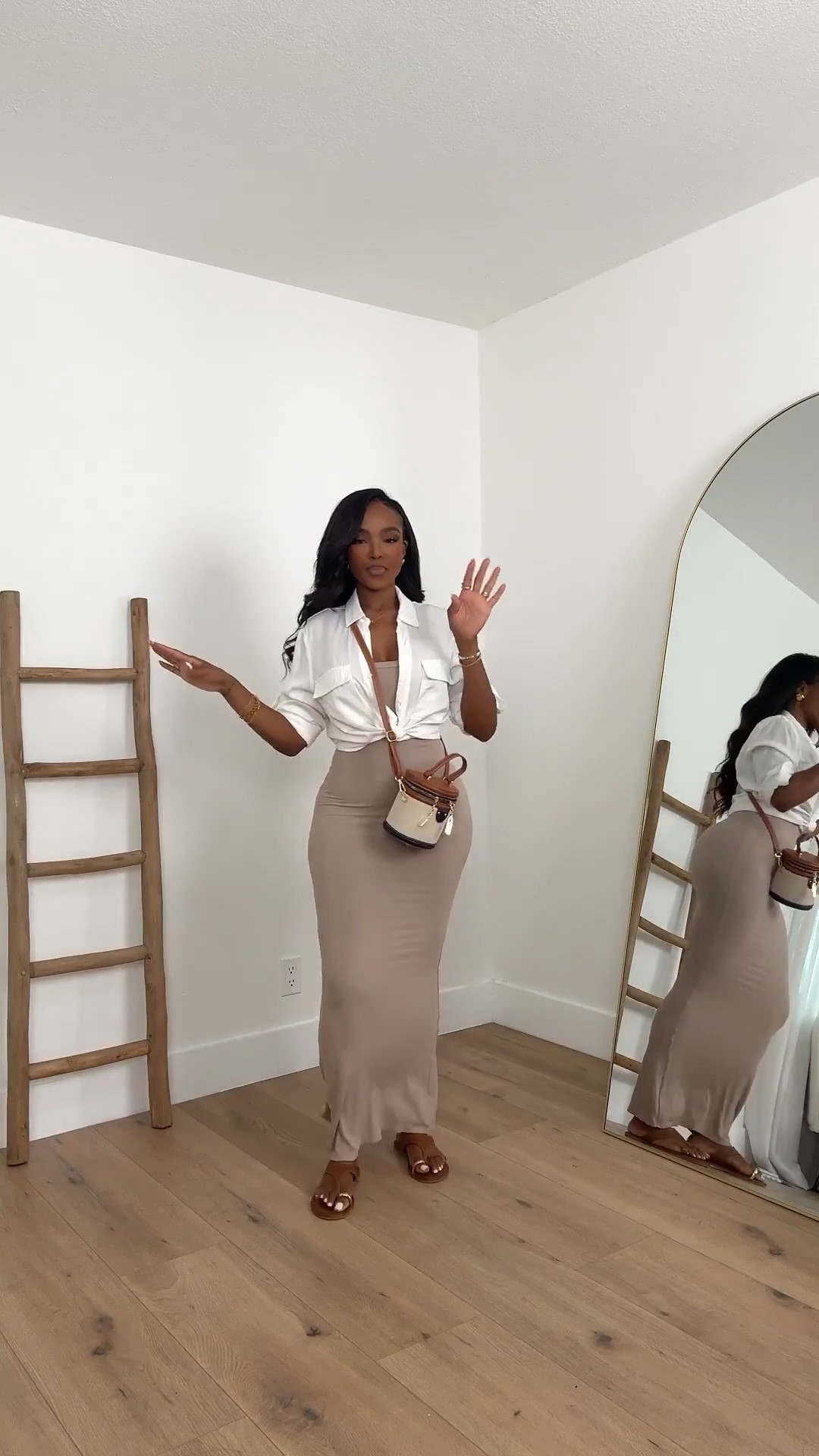 Hi Babes! 🤍✨

This is one of those outfits that looks effortlessly expensive. A crisp white shirt layered over a fitted maxi dress is the easiest way to elevate a simple look while keeping it chic and timeless.

Fit Details:
• Taupe fitted maxi dress
• White button-down shirt
• Neutral sandals
• Two-tone mini handbag
• Gold jewelry

Where to wear:
• Brunch
• Vacation
• Lunch date
• Shopping
• Casual dinner
• Weekend plans

Everything is linked below!

xx, Kira | IG: KirasFashionFinds

Measurements: 5'3" | Wearing Size XS
