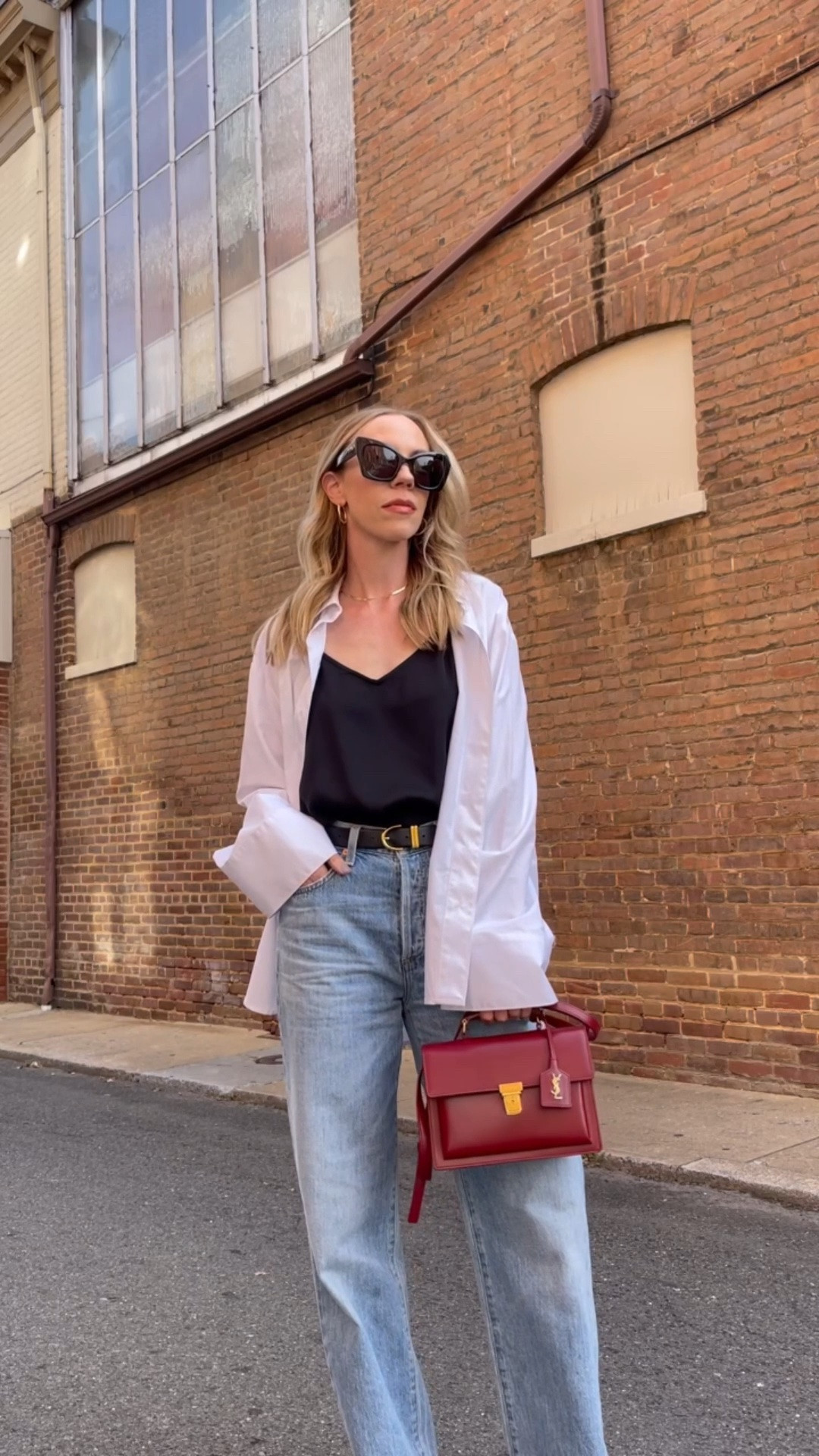 Transitional outfit for early fall with oversized button down, camisole, wide leg jeans

#LTKSeasonal #LTKOver40 #LTKSaleAlert