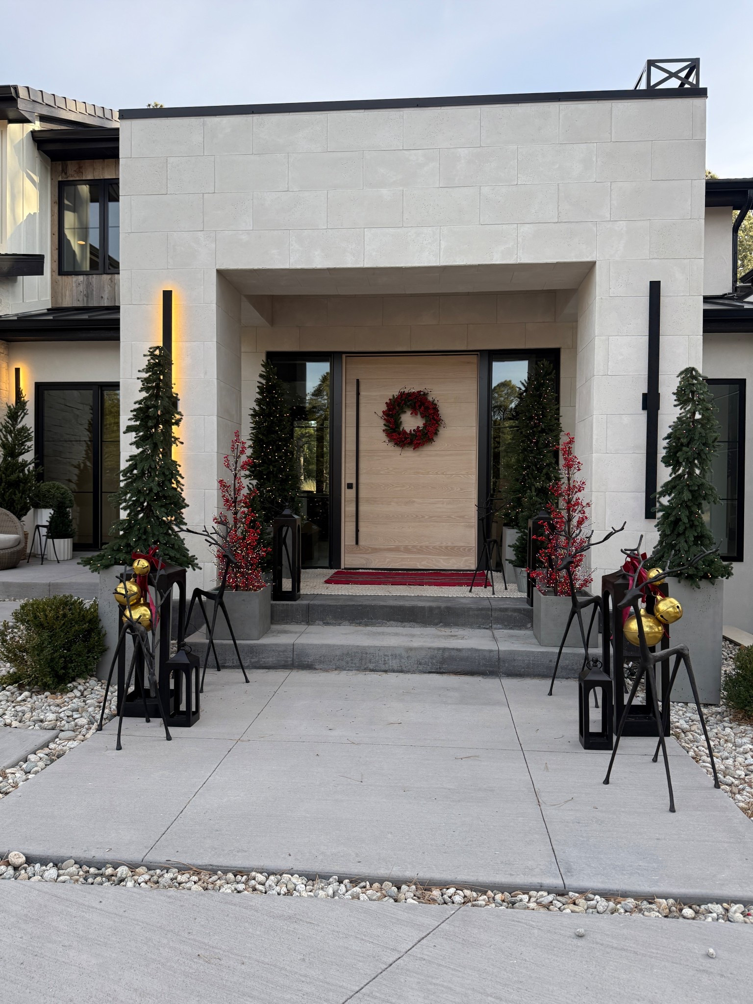 Decorating the front porch this time of year is always so fun! The red was perfection. I use the outdoor lanterns year-round.

#LTKHome #LTKSeasonal