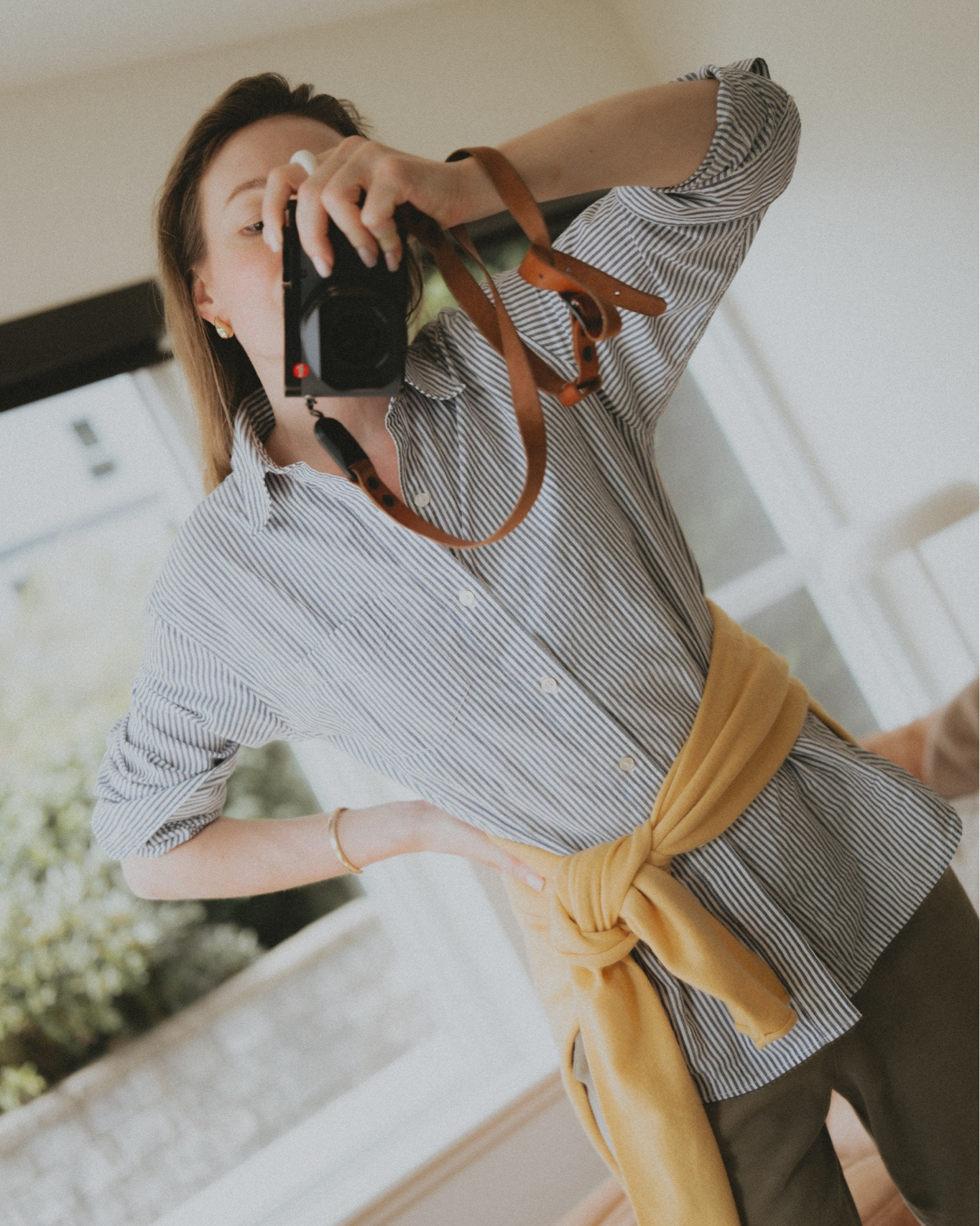 Cool mornings, warm days: layered looks. 
Shirt: Buck Mason 
Sweater: @Guest In Residence 
Earrings: Ross Simon’s

#LTKootd #LTKWorkwear #LTKTravel