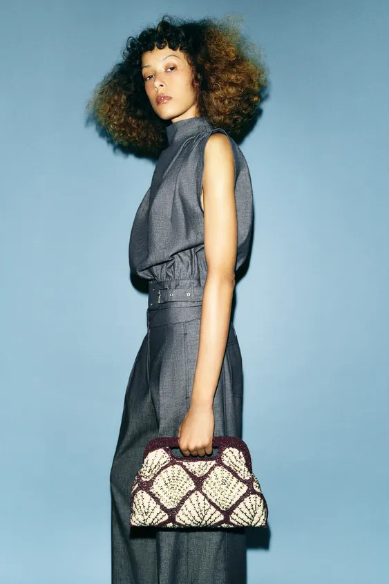 Clutch bag. Featuring a sparkly appliqué detail on the top. Double rigid handle and a removable ... | Zara UK