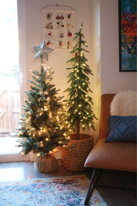 Try decorating a small space with two smaller trees, rather than the larger traditional tree! 

#LTKhome #LTKHoliday #LTKSeasonal