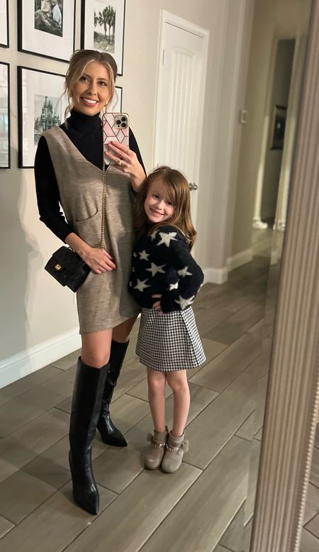 Girl’s Night Out! 🖤 Brynn’s star cardigan is the absolute cutest. It has rhinestones as buttons and so chic for a party or even school wear. Both her skort and sweater are from @kohls.

My sweater vest dress is from Amazon. I styled it with a black turtleneck and lista! These boots have a low heel and go great with any sweater dress! 



#LTKkids #LTKfamily #LTKSeasonal