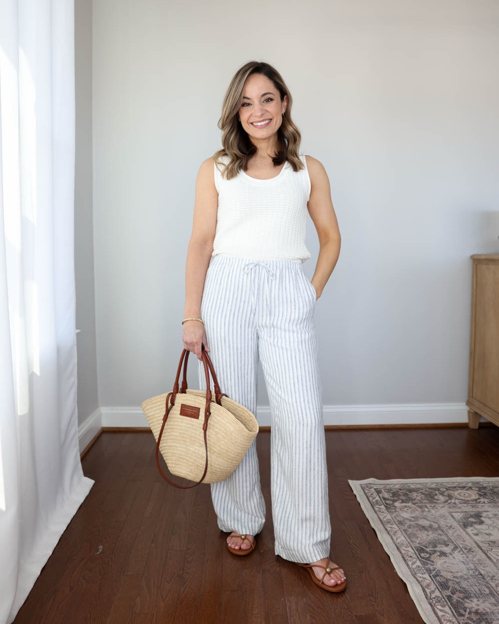 Beach ready outfits for petites styling a white waffle sweater tank!

White tank top (Quince): xs

Outfit 1:
Linen blend pants (Abercrombie): xxs short - size up if in between sizes, they shrink in the wash. 28” inseam in short
Straw bag (Sezane)
Sandals (DV): true to size 

Outfit. 2:
Linen shorts (J.Crew): xxs - unlined
Sandals (DV): true to size

Outfit 3:
Sawyer pants (LOFT): petite xxs
Sandals (DV): true to size 

My measurements for reference: I’m 4’10” and 105lbs. My bust, waist, and hip measurement is 32”, 24”, and 36”.

#LTKSeasonal #LTKPetite #LTKootd