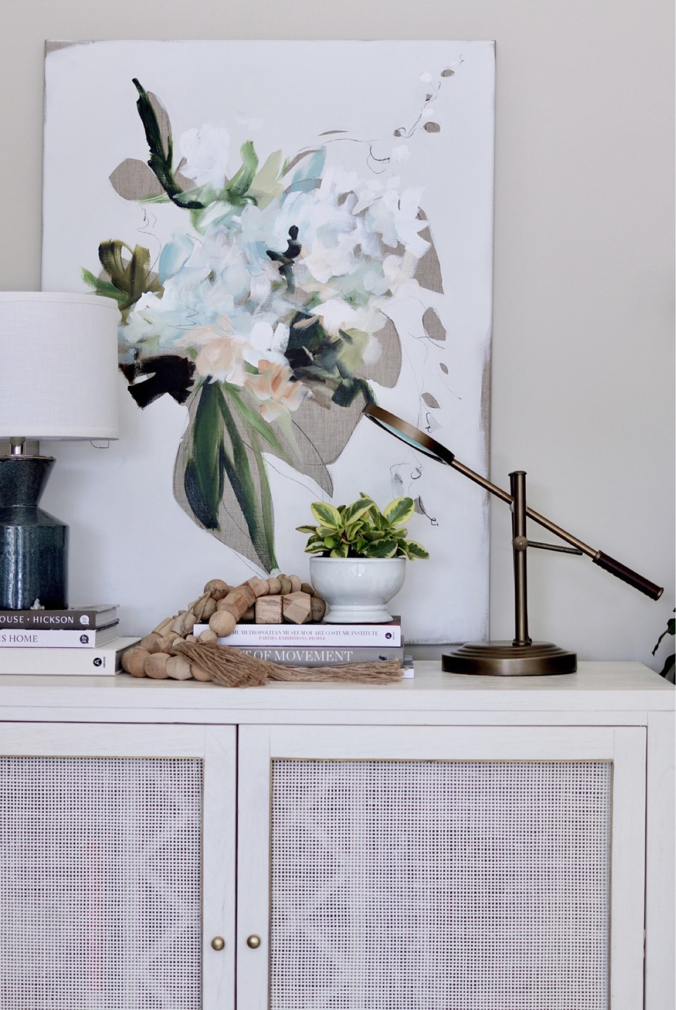 A fun console vignette- art, lamp, books, objects and plants! Voila!

#LTKhome