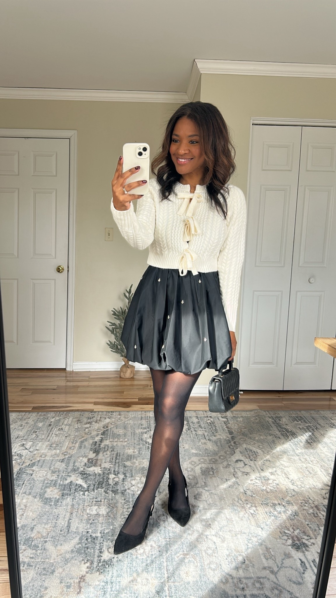 Wearing a small in cardigan and skirt 

#LTKFindsUnder100 #LTKHoliday #LTKFindsUnder50