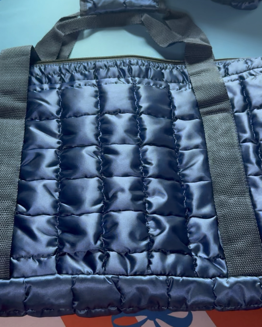 Quilted puffy tote, mat/rack bag and tile pouch. This is a trendy look that can cost upwards of $200. It is an inexpensive dupe that will give you the look for less. Note: the interior lining is very thin and could easily rip. And it’s very crinkly sounding (like a dog toy) But for the price it’s a good starter set carry all that is on trend. As of this post, it is returnable so check the return policy first. 
#mahjong
#mahjongfinds
#mahjongg
#storage
#puffer
#tote
#carryall
#dupe

#LTKGiftGuide #LTKFindsUnder50 #LTKSeasonal