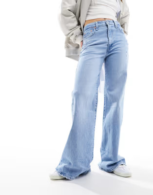 Levi's ribcage bells high rise flare jeans in light blue wash | ASOS (Global)