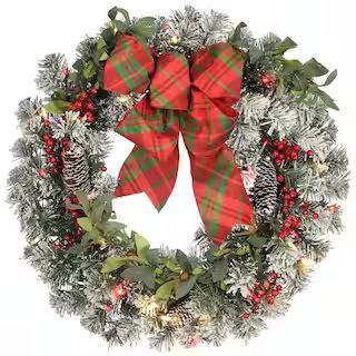 24 in. General Store Snowy Artificial Christmas Wreath with LED Lights and Bow | The Home Depot