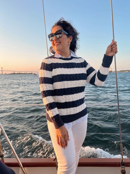 Summer sailing outfit styles. Blue and white outfit. Stripe cable knit sweater and white skinny jeans. Coastal style. 

#LTKtravel #LTKSeasonal #LTKstyletip