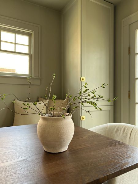 Vintage style pot with budding stems - spring home decor 

#LTKSeasonal #LTKhome