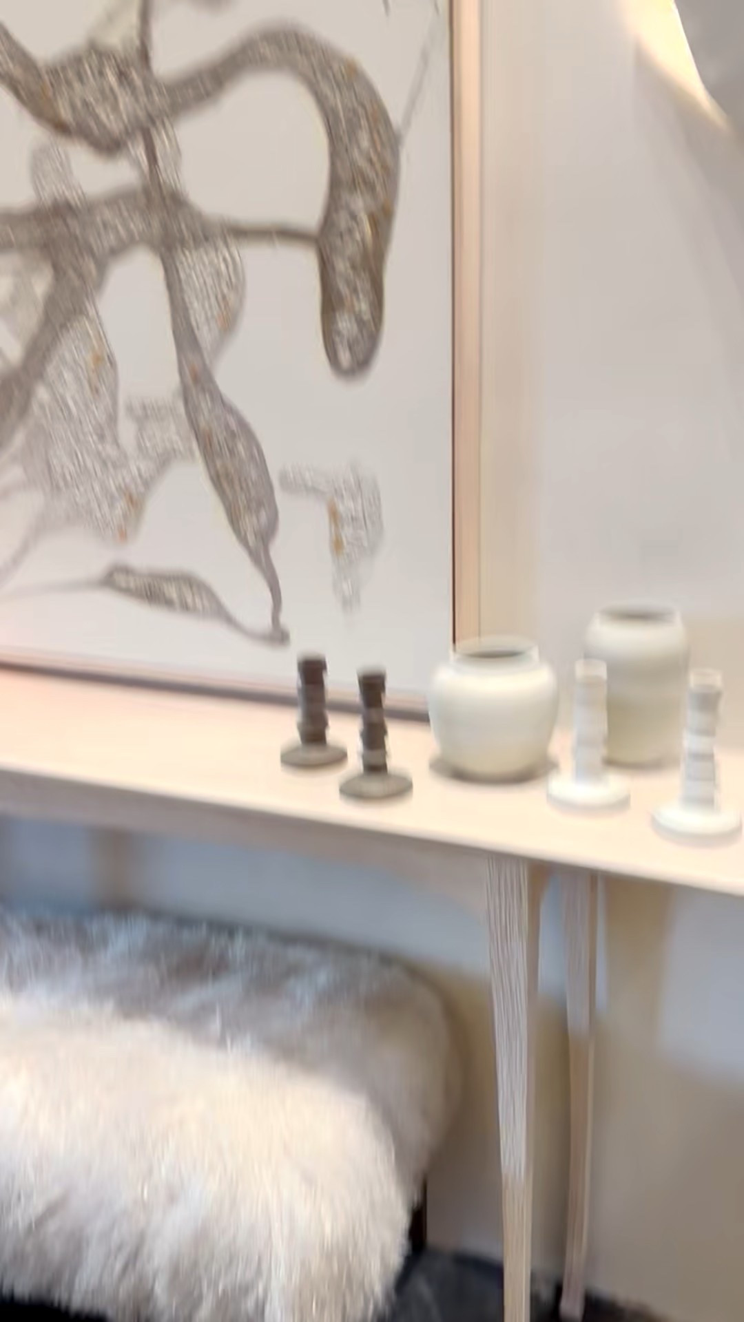 Refresh your entry for the holiday season — a sleek console, sculptural candleholders,  vase and table lamp, and oversized artwork create a quiet, collected and artful vignette, while the fur ottomans bring a rich layer of warmth and texture. ✨

#HolidayDecor #EntrywayDesign #LuxuryInteriors #ModernHome #InteriorStyling #DesignInspiration #StatementFurniture #ArtfulLiving #HomeInspo

#LTKSeasonal #LTKHoliday #LTKHome