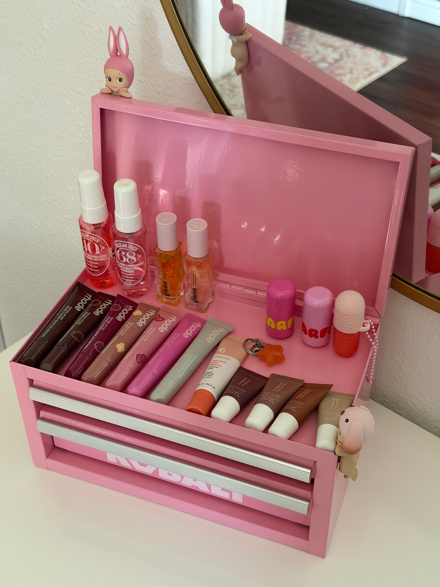 my favorite lippies 

Rhode lipsticks, lip balm, lip gloss, lip balm, storage, vanity