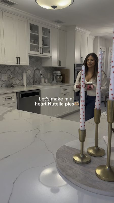 Make mini heart pies with me!🍫🥧 I love these little treat idea for loved ones🥰 Link in bio to shop my heart button cardigan! ❤️ 

#LTKhome #LTKVideo #LTKparties
