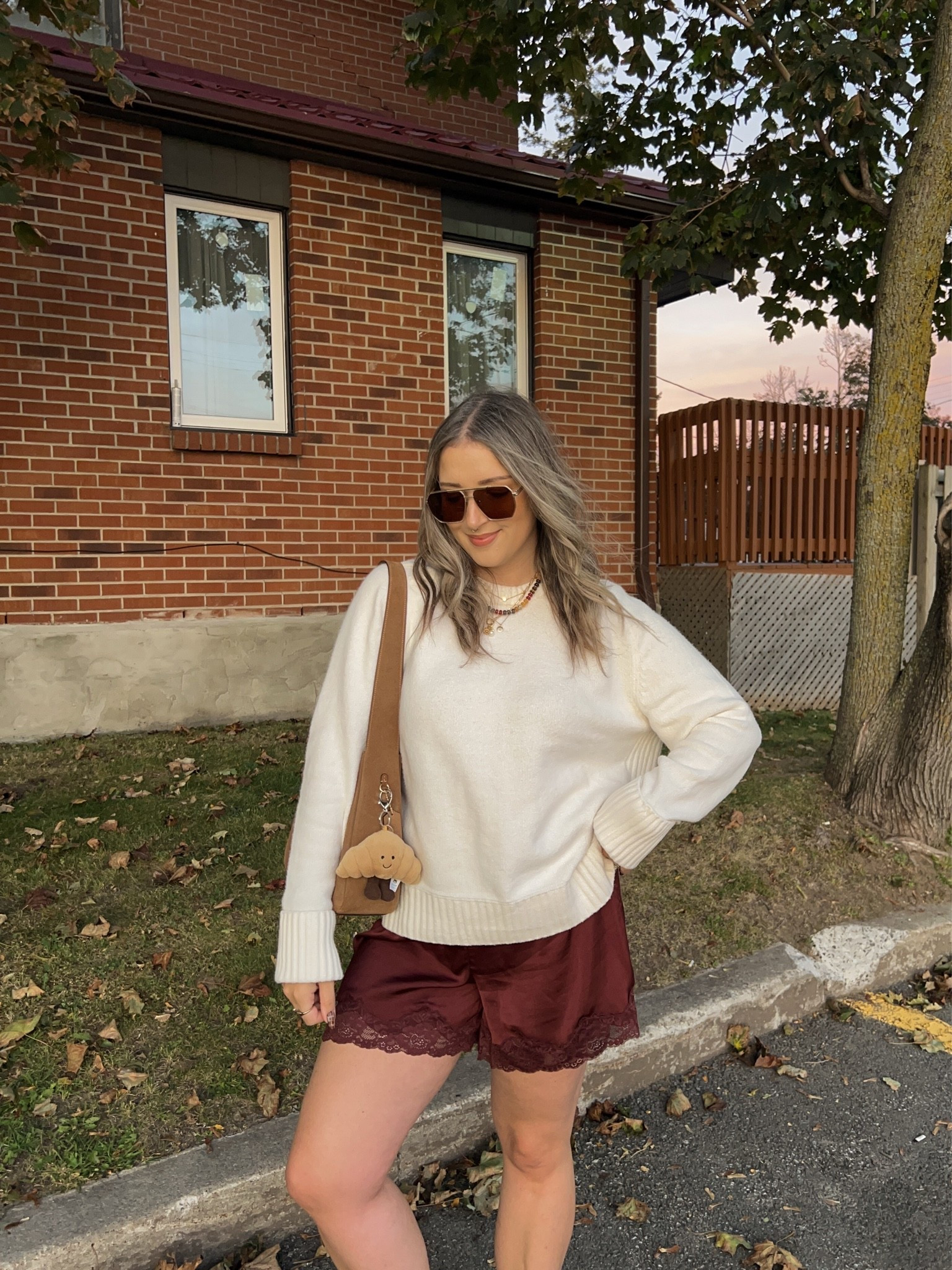 Comfy fall outfit! Sized up to XL in the sweater for an oversized fit. Wearing M in the satin lace shorts. I’m a 9.5-10 shoe and wear a 40 in the Birkenstock clogs
