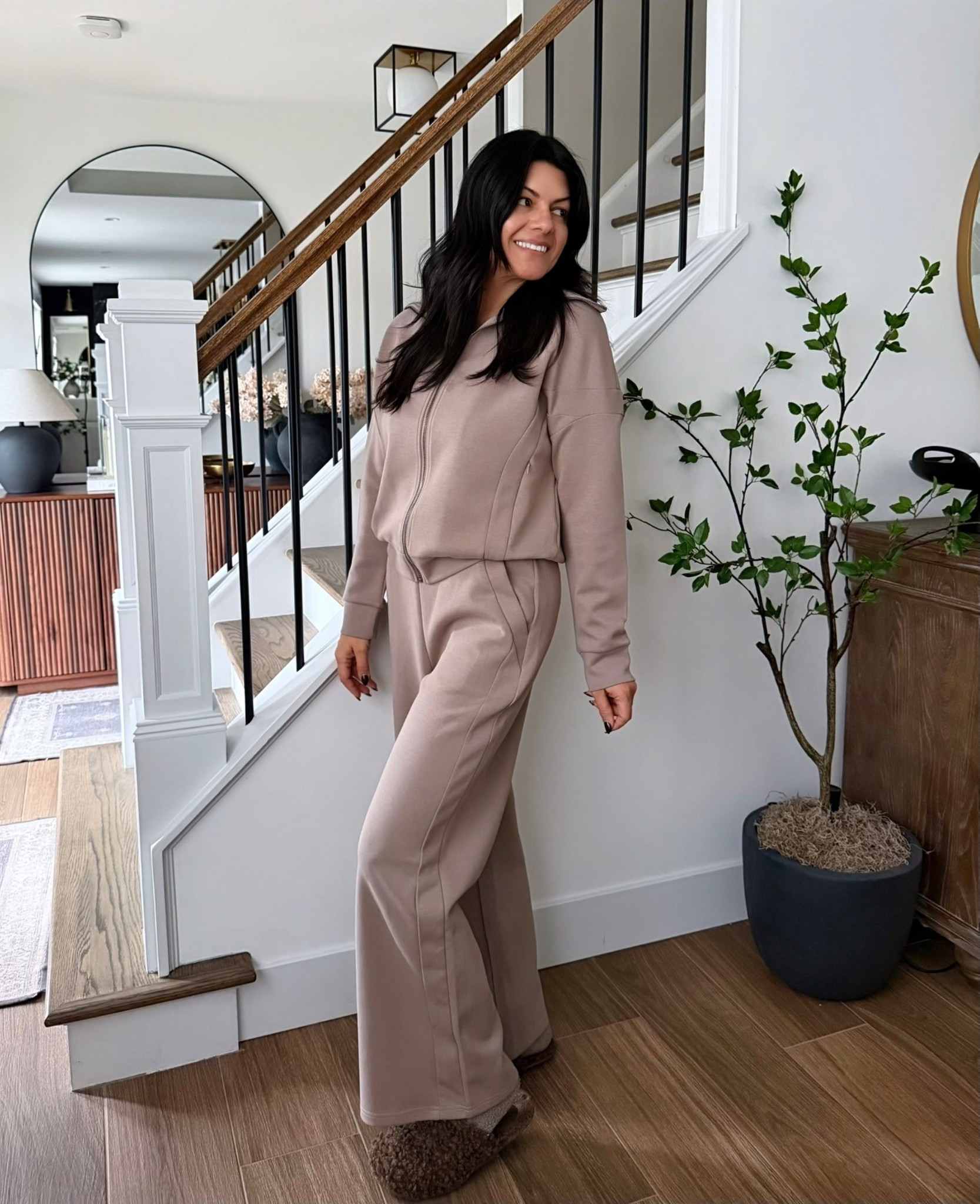 The cutest lounge set, jumpsuit, tracksuit… whatever you wanna call it! It’s so high end. The fabric is amazing. The detailing even better. The trim on the leg continues up into the jacket! Full zip, oversized collar. Great for lunch dates, running errands, brunch with the girls, school drop off… just about anything! 

#LTKgrwm #LTKmomlife #LTKOver40