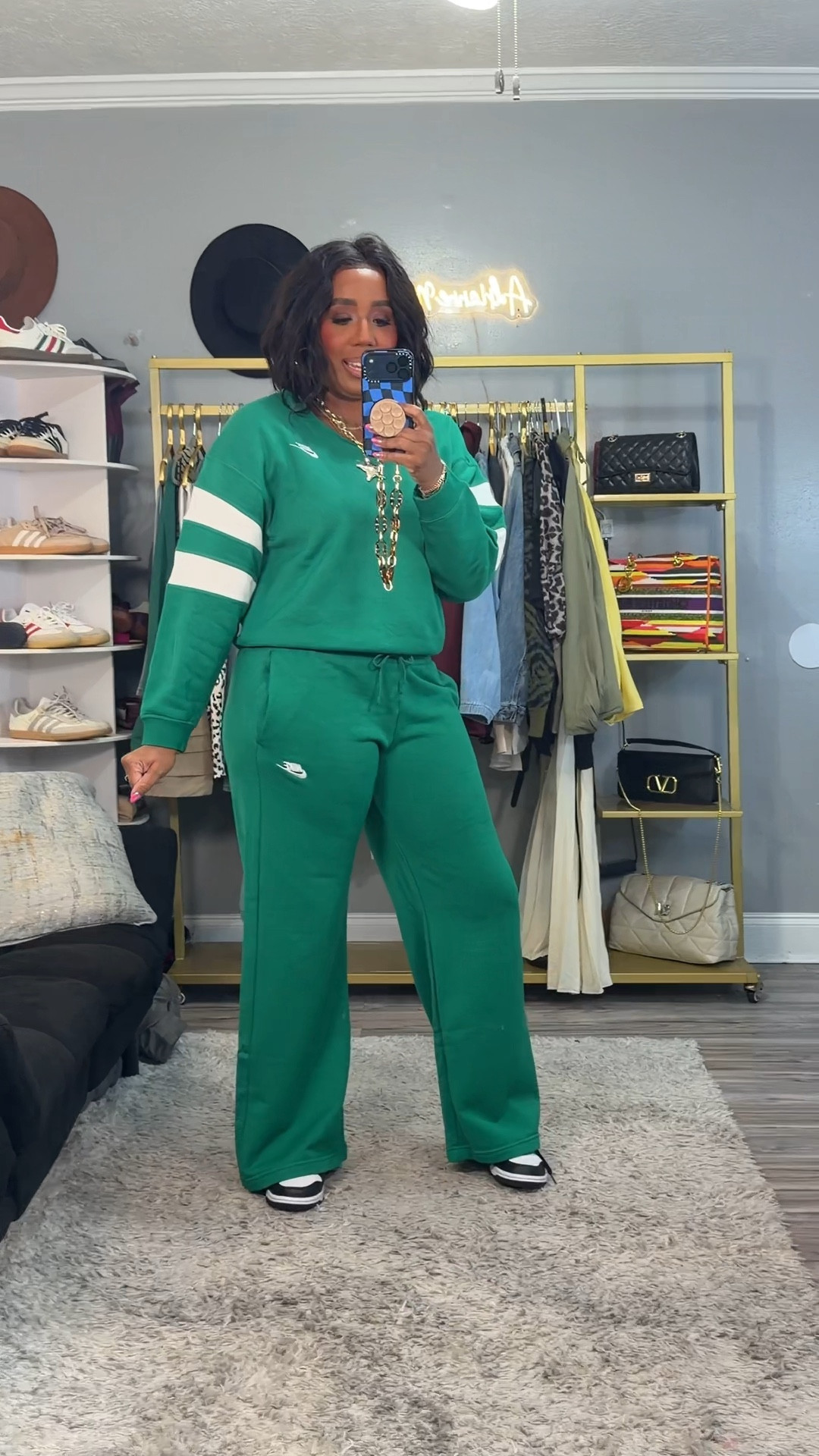 Three Nike looks… three completely different vibes 👏🏾✨

Look 1: Sporty street chic 🖤
Cropped Nike jersey paired with wide leg pants for that effortless “cool girl off duty” feel. Add chunky boots + oversized sunnies and it’s giving casual but styled.

Look 2: Elevated athleisure 💗
Striped button down + wide leg pants styled comfy but polished. Perfect for running errands, brunch, or casual work days when you still want to look put together.

Look 3: Bold & comfy 💚
Matching Nike set in this standout green is EVERYTHING. Soft, relaxed fit but still flattering. Throw on sneakers and you’re ready for travel days, school drop off, or weekend lounging in style.

All pieces are linked here for easy shopping 🛍️
Comfort + confidence every single time.

#LTKActive #NikeStyle #AthleisureWear #SportyChic #Over40Style #CasualChic #NikeWomen #EverydayStyle