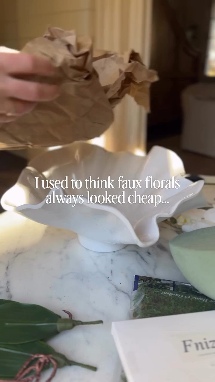 You are going to love these faux orchids! One less thing to keep alive 👏🏼 SAVE this so you can reference later!

This is an easy DIY that anyone can do. You just need the right orchid stems, some foam and moss! If you have a great vessel or bowl laying around, give it a shot! My only tip is that you make sure it is deep enough.

#orchidarrangement #fauxorchid #floralarrangement 

#LTKWedding #LTKHome #LTKSeasonal
