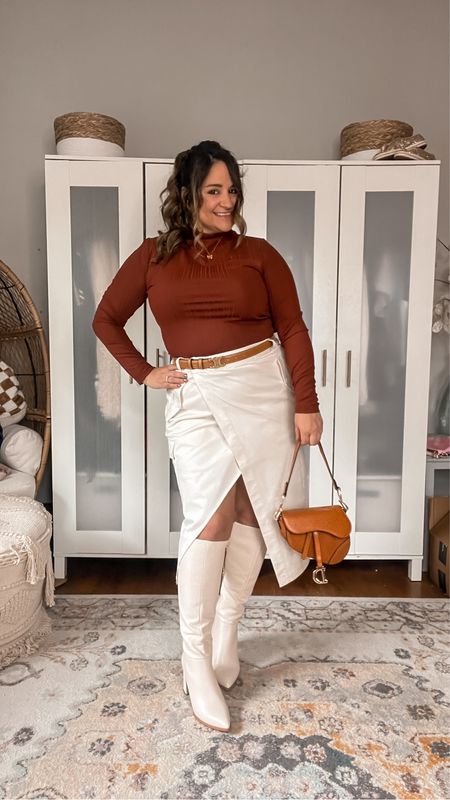 It finally feels like Fall 🍂

Ready to wear to work or a night out in this mock turtleneck in a gorgeous rust color paired with this cargo midi skirt and cream knee high boots! All from target!

Wearing an L in the mock neck and a size 13 in the cargo skirt

Midsize
Curvy
Midi skirt
Cargo skirt
Knee high boots
Square heel boot
Pointed toe boot
Saddle bag
Skinny belt
Brown belt
Target style 
Fall outfit
Work outfit 

#LTKmidsize #LTKshoecrush #LTKworkwear