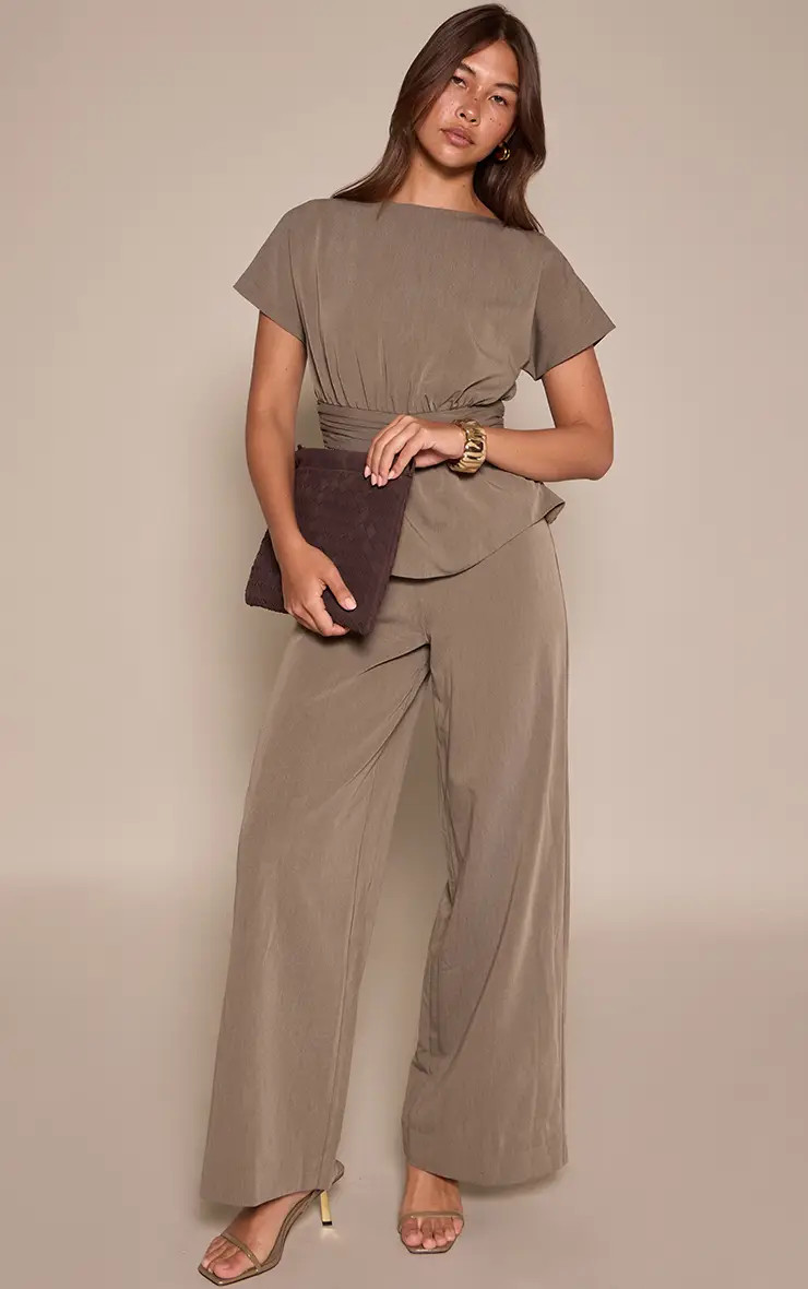 Khaki High Neck Peplum Jumpsuit | PrettyLittleThing USA | PrettyLittleThing US