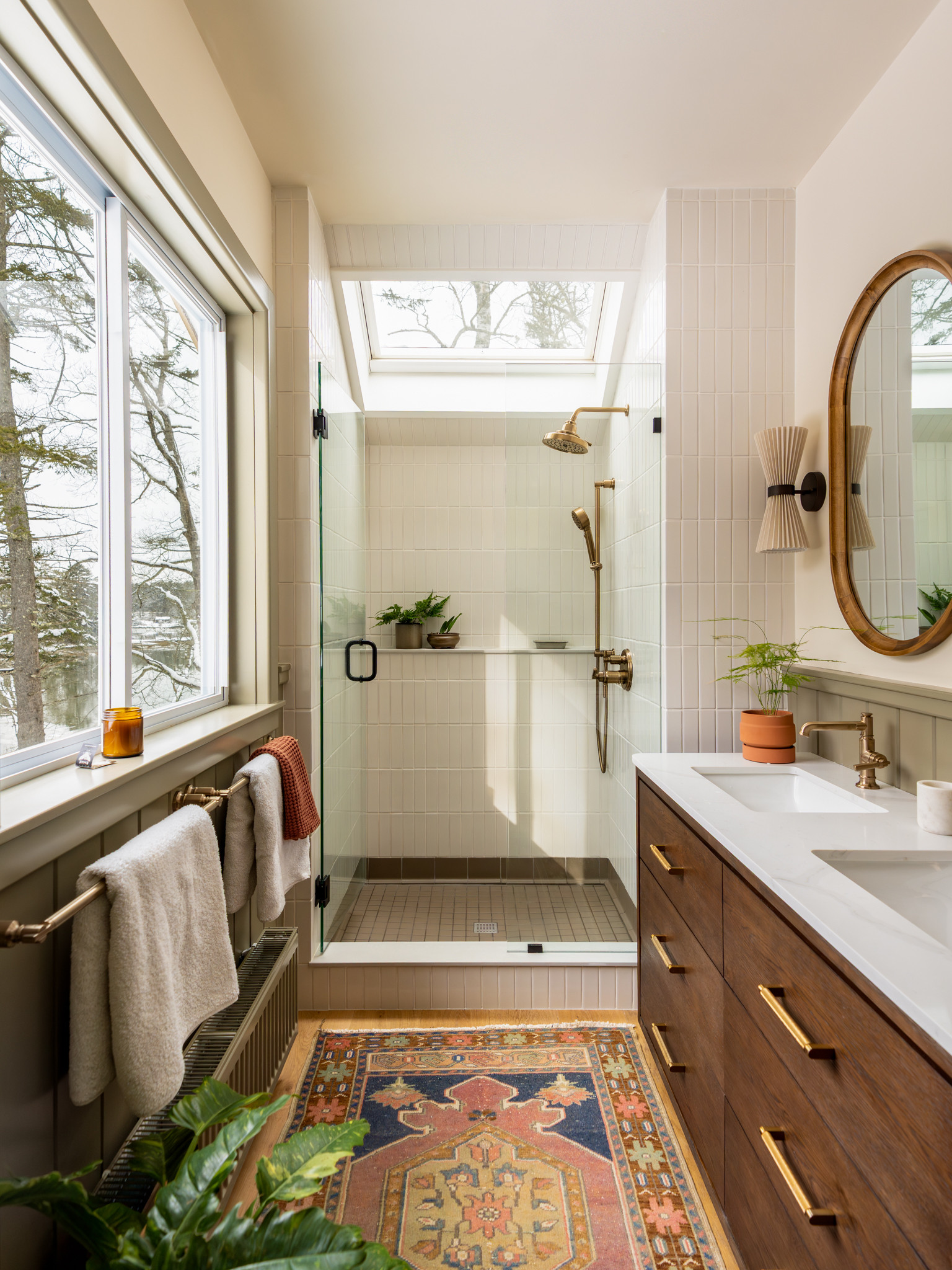 We completed our bathroom renovation for our Maine Suite and this space has totally transformed! It's so much brighter with the addition of the bigger windows and skylight, and the finishes make it both cozy and fresh. 

 #LTKmorningroutine #LTKselfcare #LTKHome