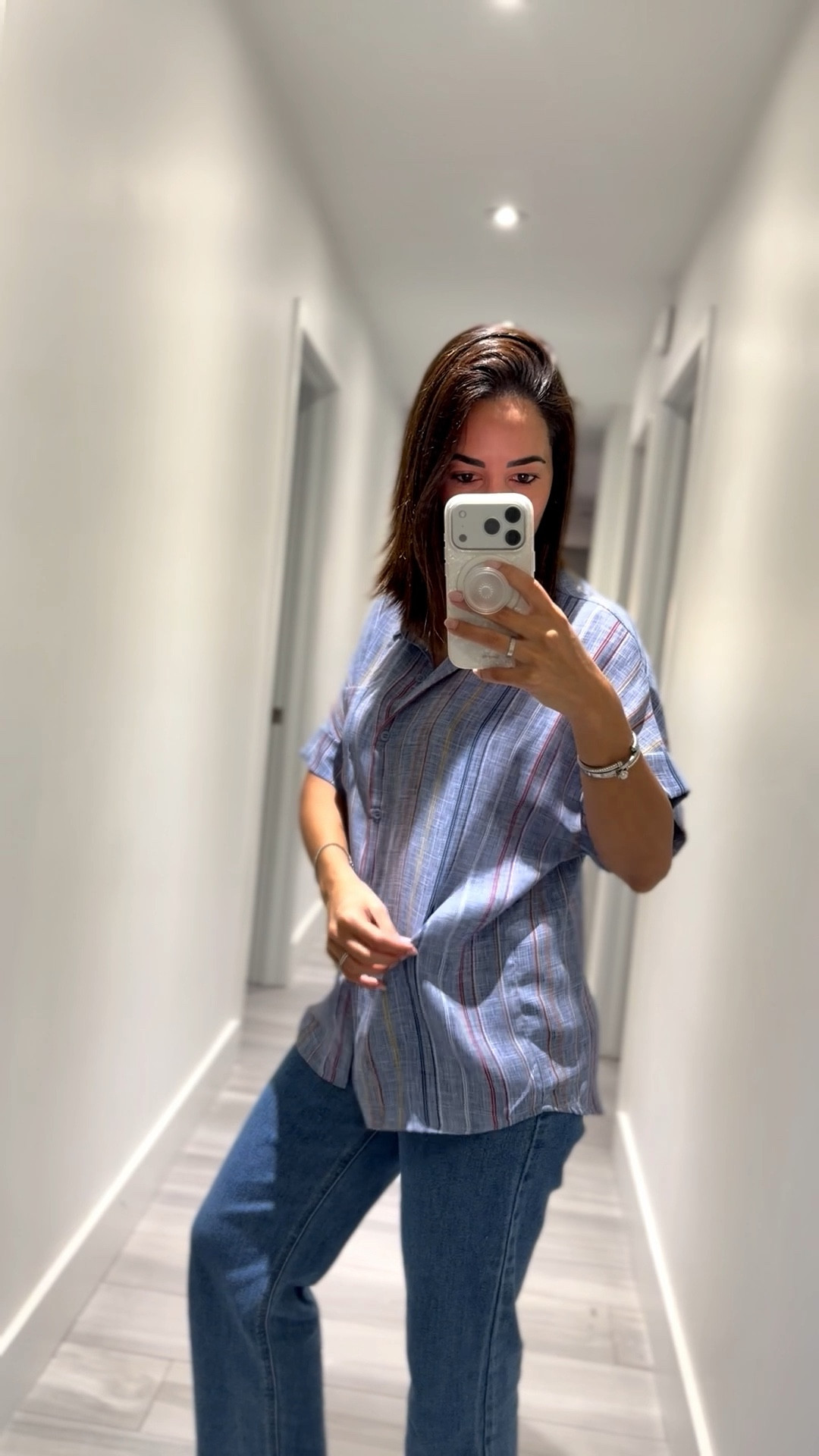 On repeat 🔁 this light weight button down is a must have closet staple for spring and summer. 