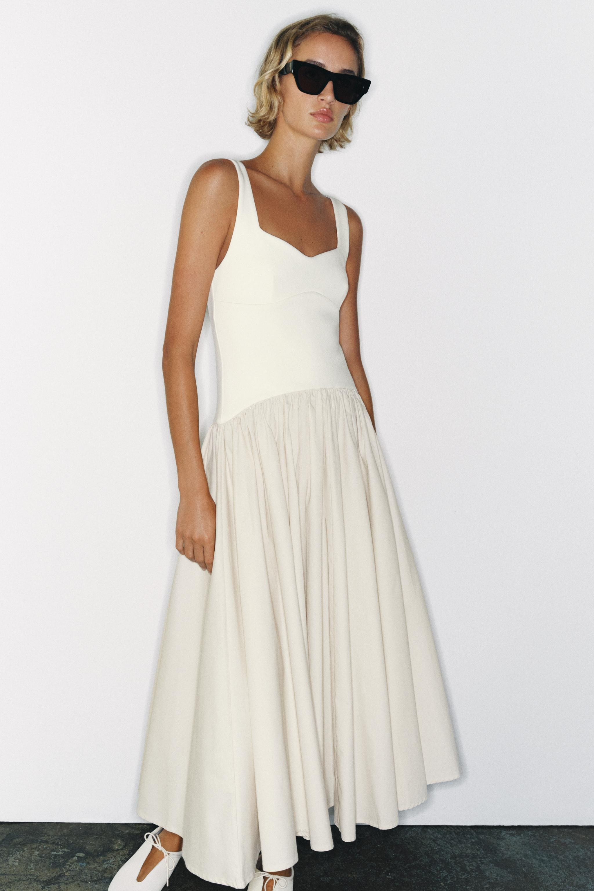 Dress crafted from cotton-blend fabric. Features a sweetheart neckline and wide straps, accented ... | Zara US