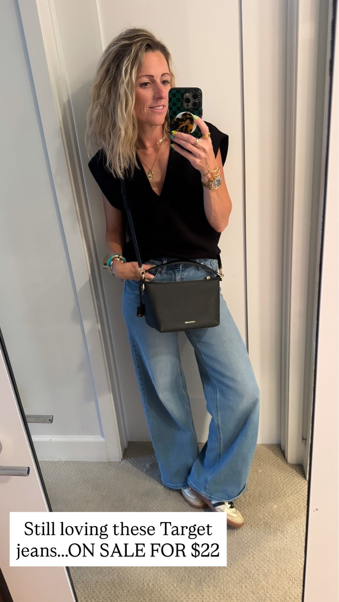 These target jeans are so good and currently on sale for just $22. I’m also obsessed with this black Crossbody it’s a great everyday bag.  

#GirlsNight #TargetStyle #TargetJeans #CasualOutfit ￼

#LTKmomlife #LTKOver40
