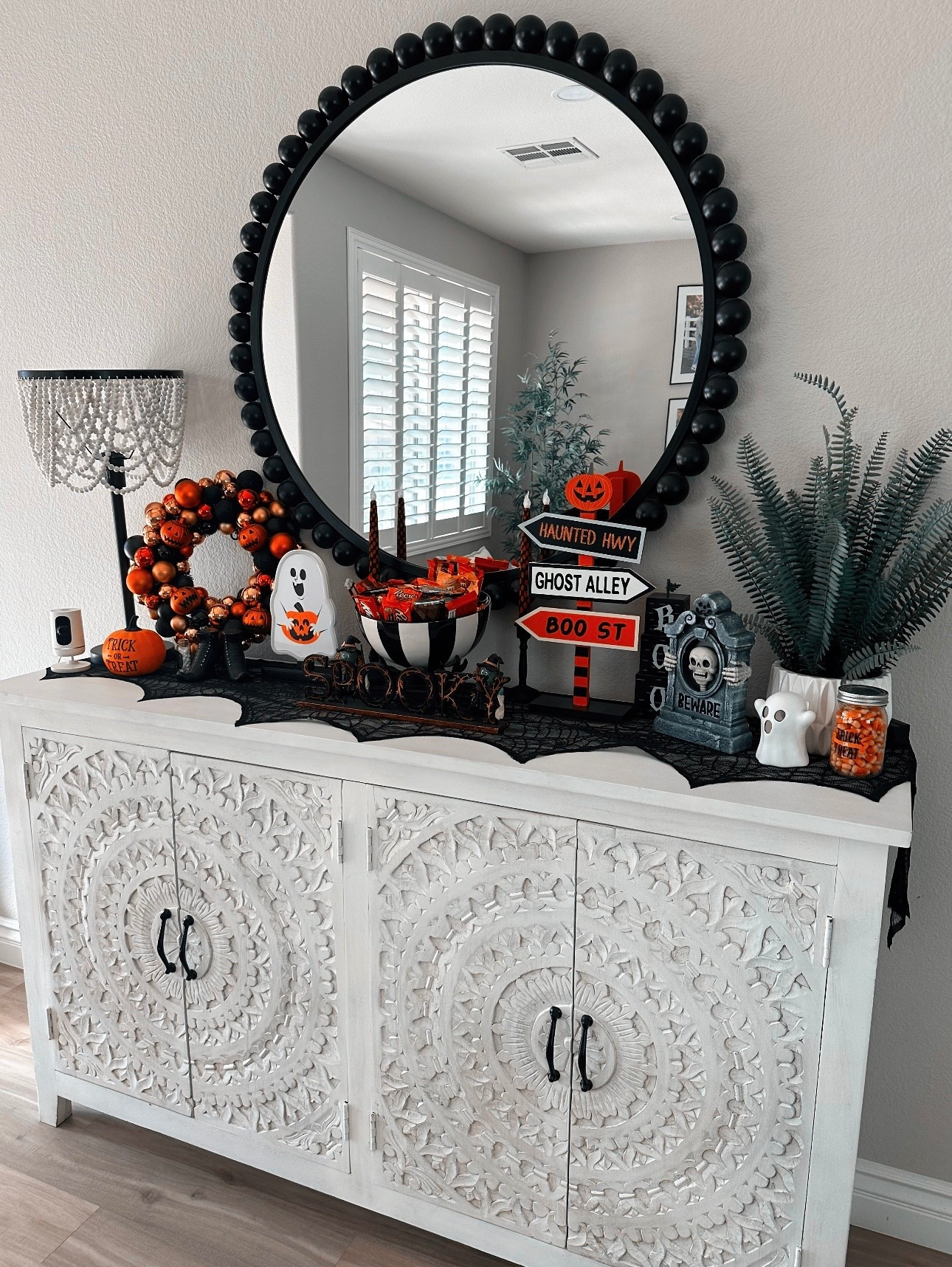 Indoor Halloween Decor for the home. Entry way table cabinet

Wreath, spiderweb, pumpkins, spooky, ghosts, sign, candy bowl, candy dish, fall, decorations

#LTKHome #LTKSeasonal #LTKHalloween