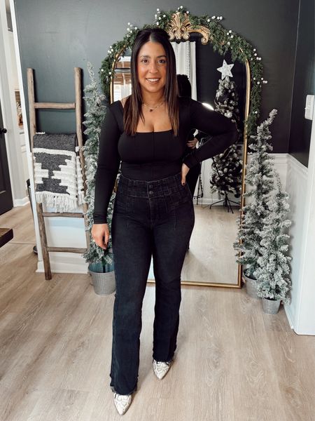 All black everything🖤❤️ It's sleek, it's classic, and it's easy. This outfit is perfect for a winter date night (including Valentine's Day dinner). This super simple outfit formula starts with a black Amazon corset top (size Small), then the viral SUPER FLATTERING Free People jeans in black, then booties that aren't black. I am wearing snakeskin ankle boots, however, any color to boot to add a pop of color would work! BONUS TIP: add a bow to your hair to make this look extra fancy. Petite, petite friendly, black corset, Amazon finds, date night, winter date night, date night inspo, outfit inspo

#LTKSeasonal #LTKMostLoved #LTKparties