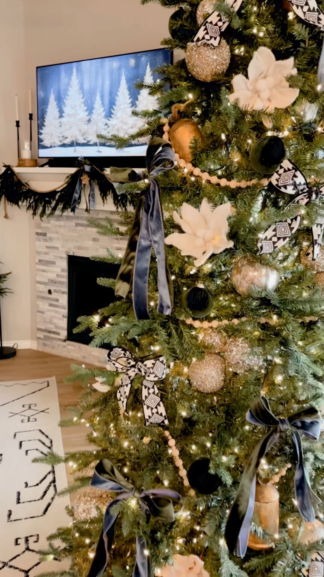 2024 Christmas Decor 
Tree is King of Christmas - slim, 7.5’ prelit King Frasier - on major sale! 
Aztec ribbon and white felt flowers are from Hobby Lobby 
Garland and potted tree is SUCH good quality! 

#LTKSaleAlert #LTKSeasonal #LTKHoliday